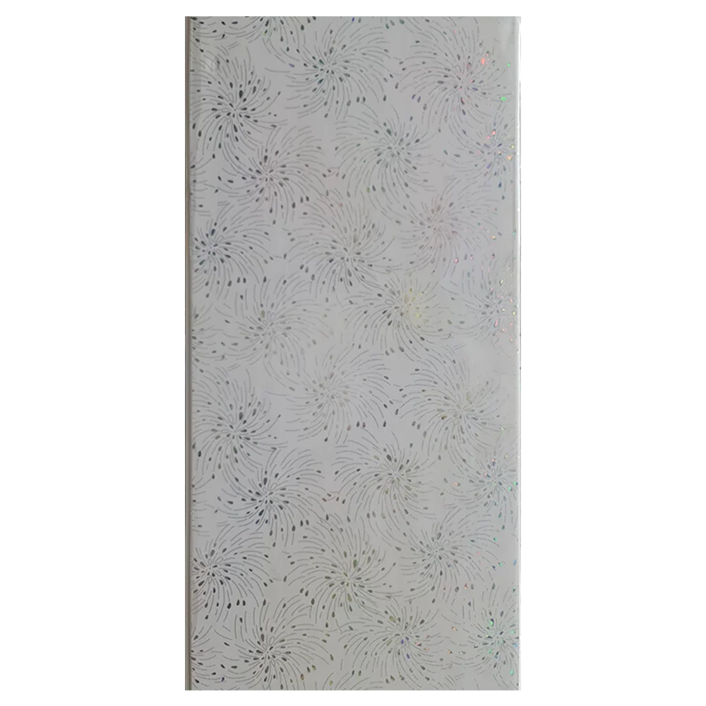 A textured white panel featuring a delicate, scattered pattern of small, colorful dots resembling confetti or starlight. Its Called White starlight PVC Ceiling Panels.