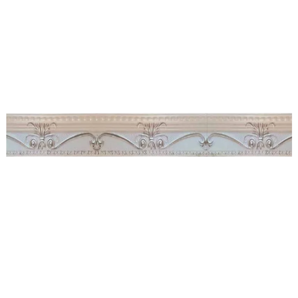 Ornate plaster crown molding featuring scrollwork and floral motifs, showcasing a delicate and elegant design. Its Called Polystyrene T-Series Cornice White and Sliver 100mmx2m