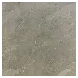 A textured gray stone surface featuring subtle veining and a polished finish, ideal for flooring. Its Called Glossy Polished Grey Porcelain tiles